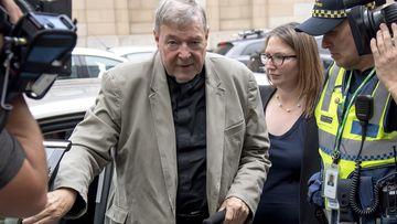 Cardinal George Pell leaves the County Court in Melbourne, Australia, Tuesday, Feb. 26, 2019.