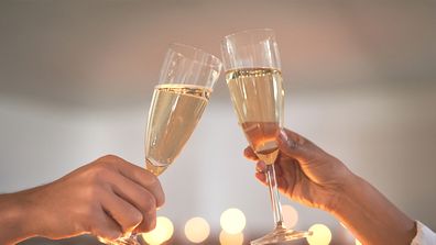 Couple cheers champagne celebration 