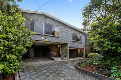 Melbourne family home that's reminiscent of The Brady Bunch is on offer and is expected to sell for just under $2 million. 
