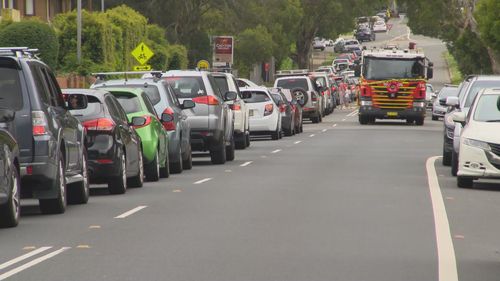 Large queues are forming at road border checkpoints as interstate travellers make their way out of NSW.