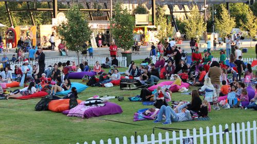 Adelaide residents getting into the festive spirit (Image: AAP)