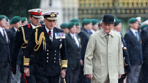 Britain's Prince Philip, Duke of Edinburgh, in his role as Captain General, Royal Marines, attends a Parade to mark the finale of the 1664 Global Challenge on the Buckingham Palace Forecourt in central London on August 2, 2017. (AFP)