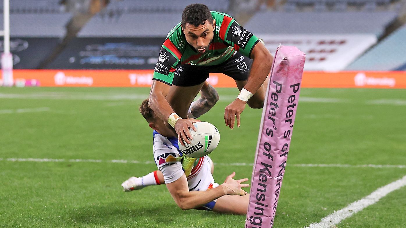 Alex Johnston of the Rabbitohs scores a try