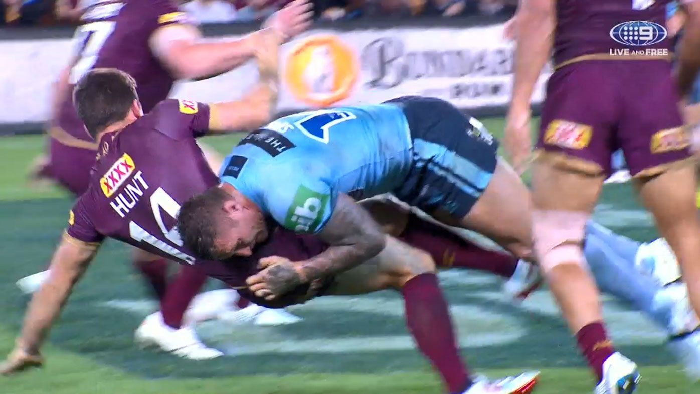 Tariq Sims tackles Ben Hunt without the ball.