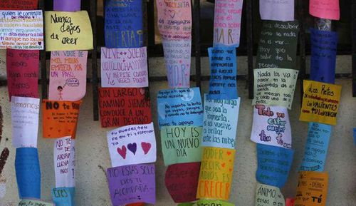 Inspirational messages written by asylum seekers are posted in the main entrance of a former concert venue known as El Barretal, now serving as a makeshift shelter for Central American migrants seeking asylum in the U.S., in Tijuana, Mexico