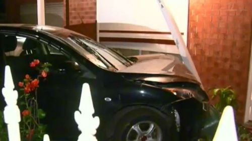 A car smashed through the house in Noble Park before 3am. (9NEWS)