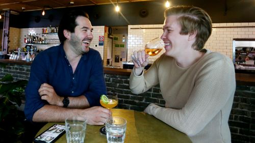 Patrons return to the Kings Cross Hotel in Sydney after COVID-19 restrictions eased, allowing pubs and businesses to reopen. 