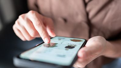 Woman shopping using smart phone