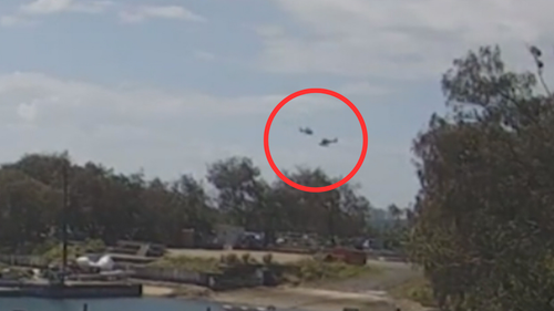 An inquest into the Sea World helicopter crash has been shown several videos of the moment the aircraft collided.