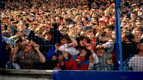 Images from 1989 show people crammed into Hillsborough stadium. (AAP)