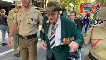 WWII vet joins Sydney march at 104