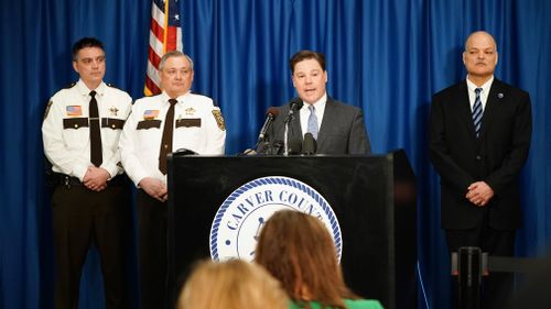 Carver County Attorney Mark Metz, centre, announces at a press conference that no criminal charges will be filed relating to the death of Prince. (AP)