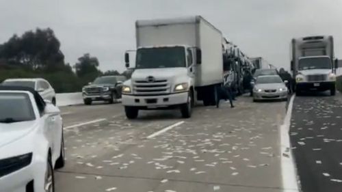 Money flew out of a truck with over a million dollars in California. 
