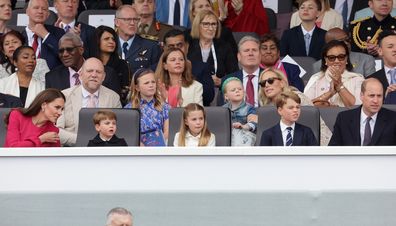 (L-R 2nd row) Mike Tindall, Mia Tindall, Victoria Starmer, Lena Tindall, Zara Tindall, (front row) Catherine, Duchess of Cambridge, Prince Louis of Cambridge and Prince William, Duke of Cambridge watch the Platinum Pageant on June 05, 2022 in London, England.