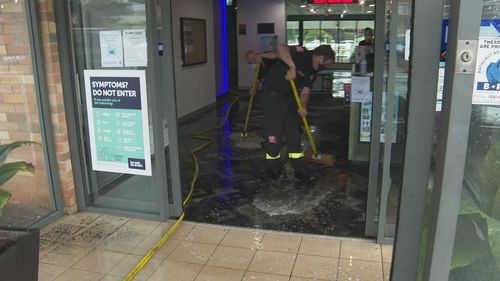 Emergency services swept water from businesses in Lithgow.