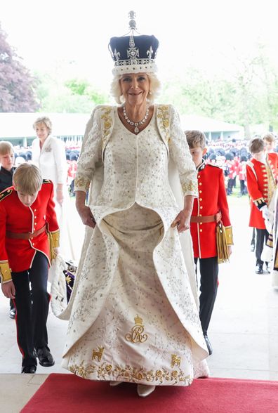 Queen Camilla smiles after her Coronation with King Charles III, at Buckingham Palace on May 06, 2023 in London, England.