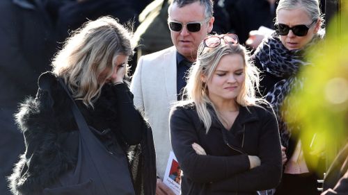 Mourners at Ms Dixon's funeral.