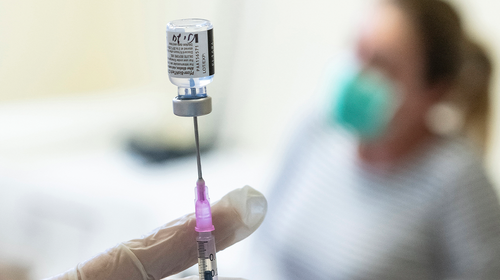 A nurse prepares a dose of Pfizer-BioNTech vaccine against the new coronavirus to be injected at the Andras Josa Teaching Hospital in Nyiregyhaza, Hungary, Sunday, Jan. 24, 2021. (Attila Balazs/MTI via AP)