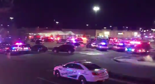 Dozens of police cars converged on the Walmart. (Twitter)