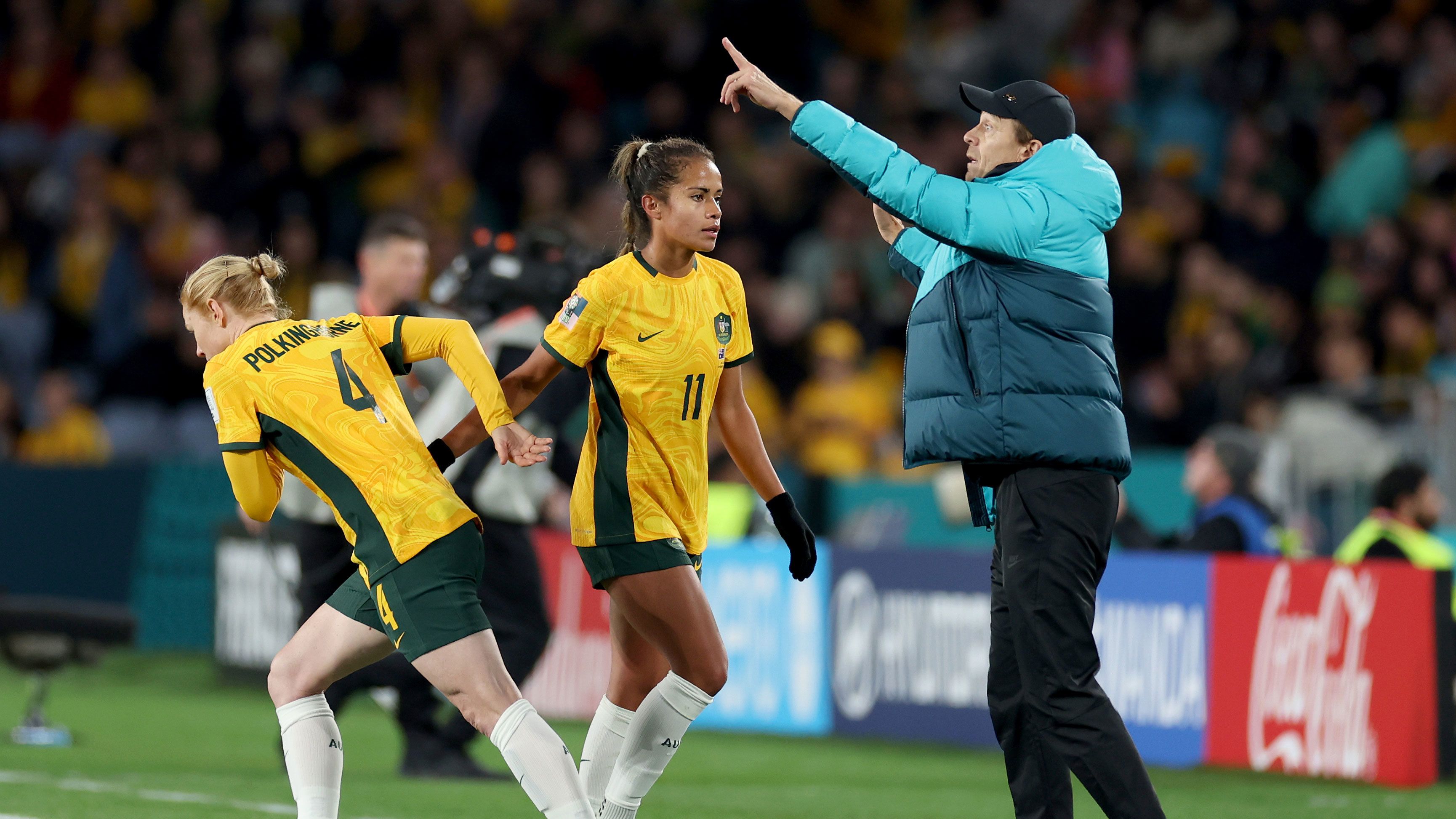 Clare Polkinghorne is brought on for Mary Fowler while Matildas coach Tony Gustavsson gives the team instructions during the second half of their clash with Ireland.