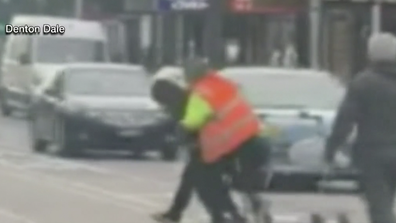 Video of the arrest shows Mr Dale apprehend the suspect in a Hi-Vis vest. 