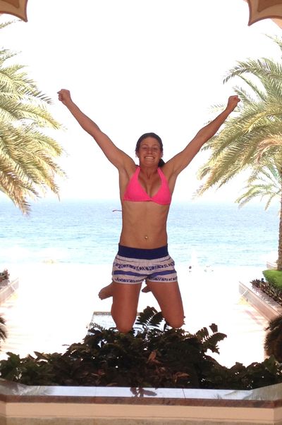 Mel jumping for joy in the beautiful oasis that is Oman.