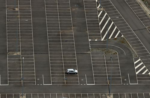 A lone vehicle is seen at the Melbourne International Airport long term car park on August 26