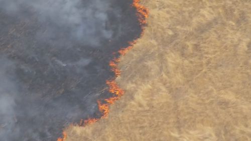 Homes are under threat from a fierce fire burning at Flowerdale north-east of Melbourne.