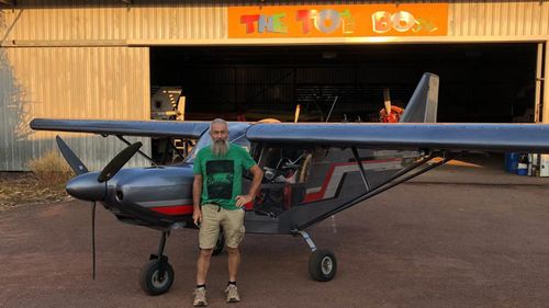 John Gotts with his plane.