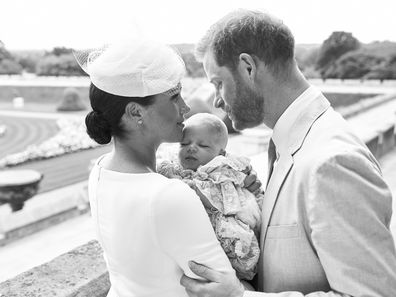 In one photograph taken by Chris Allerton, the Duke and Duchess of Sussex hold their son Archie Harrison Mountbatten-Windsor in the Rose Garden in Windsor Castle. 