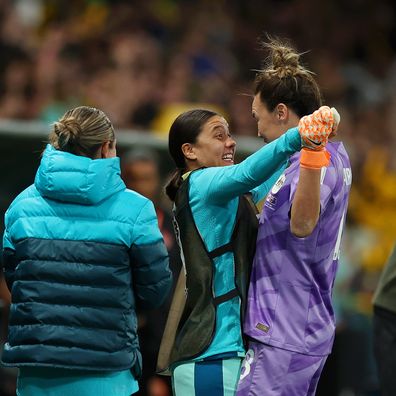MELBOURNE, AUSTRALIA - JULY 31: Sam Kerr (2nd L) of Australia congratulates Mackenzie Arnold (2nd R) after the team's 4-0 victory and qualification for the knockout stage following the FIFA Women's World Cup Australia & New Zealand 2023 Group B match between Canada and Australia at Melbourne Rectangular Stadium on July 31, 2023 in Melbourne, Australia. (Photo by Cameron Spencer/Getty Images)