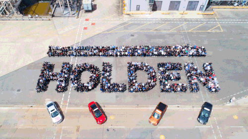 A supplied aerial image of staff posing for a photograph on the last day of production at the Holden plant in Elizabeth, Adelaide. (AAP)