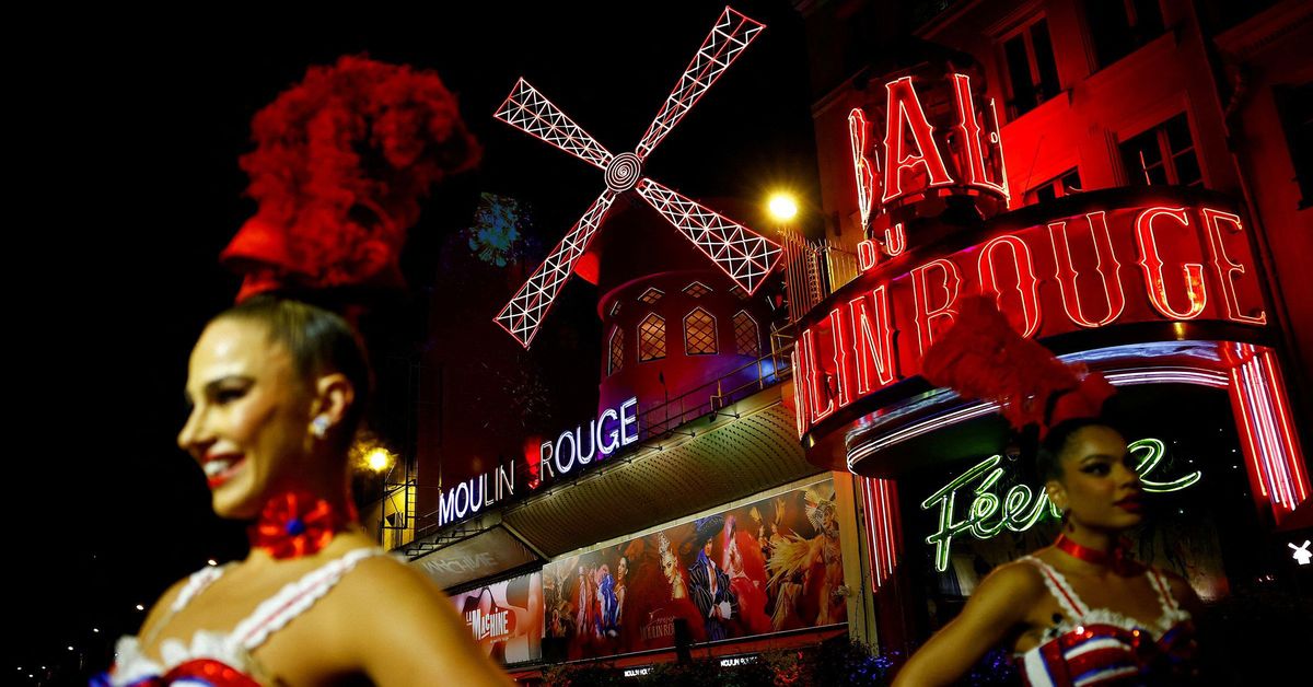 Paris' famous Moulin Rouge windmill gets its blades back after three months