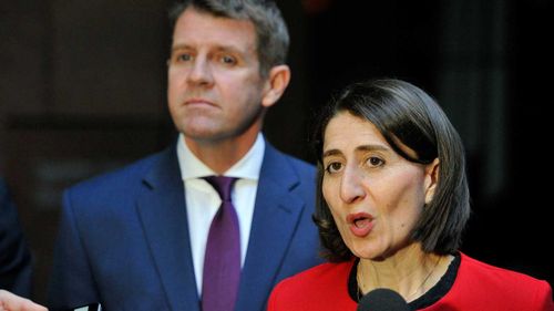 Mike Baird with frontrunner for premier Gladys Berejiklian. (AAP)