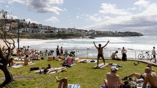 People enjoy the sunshine on the Labour Day long weekend public holiday at Bronte Beach, Sydney, Monday October 3, 2022. 