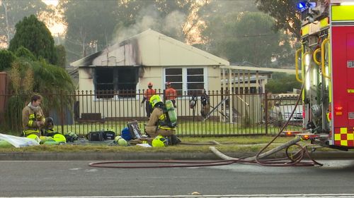 A man in a wheelchair was whisked to safety from his home this morning as a fire broke out in the property. Picture: 9NEWS.