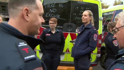 Emergency workers joined the premier as he made the announcements today. (9NEWS)