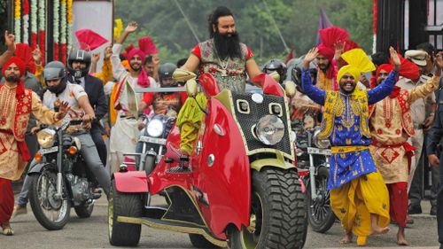 Gurmeet Ram Rahim Singh, 51, was handed down the sentence via video link during a court session in Panchkula, Haryana state last week. 