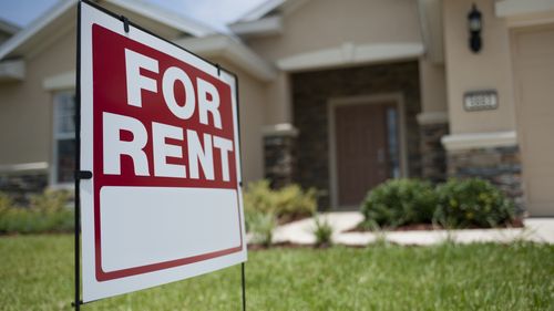 For Rent sign in front of new house