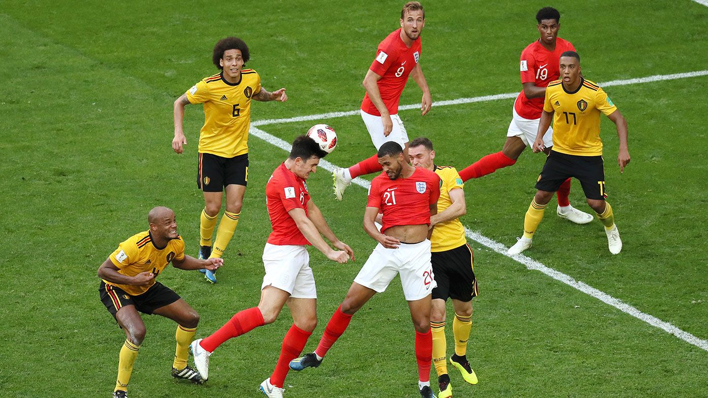 Harry Maguire of England competes for a header in the World Cup third place playoff against Belgium