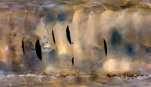 An aerial image showing the Mars dust storm that makes the planet look brighter from Earth. The small blue dot is the NASA rover Opportunity. (Image: NASA).