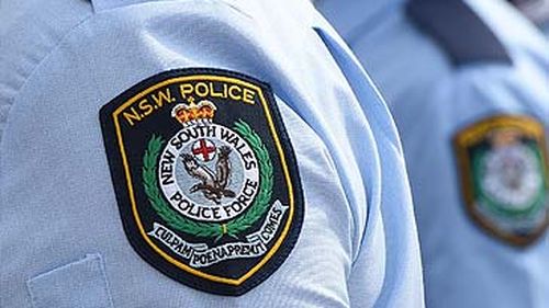 Shoulders of NSW police officers (AAP)