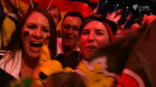 Australian fans cheer Sebastian's performance. (SBS)