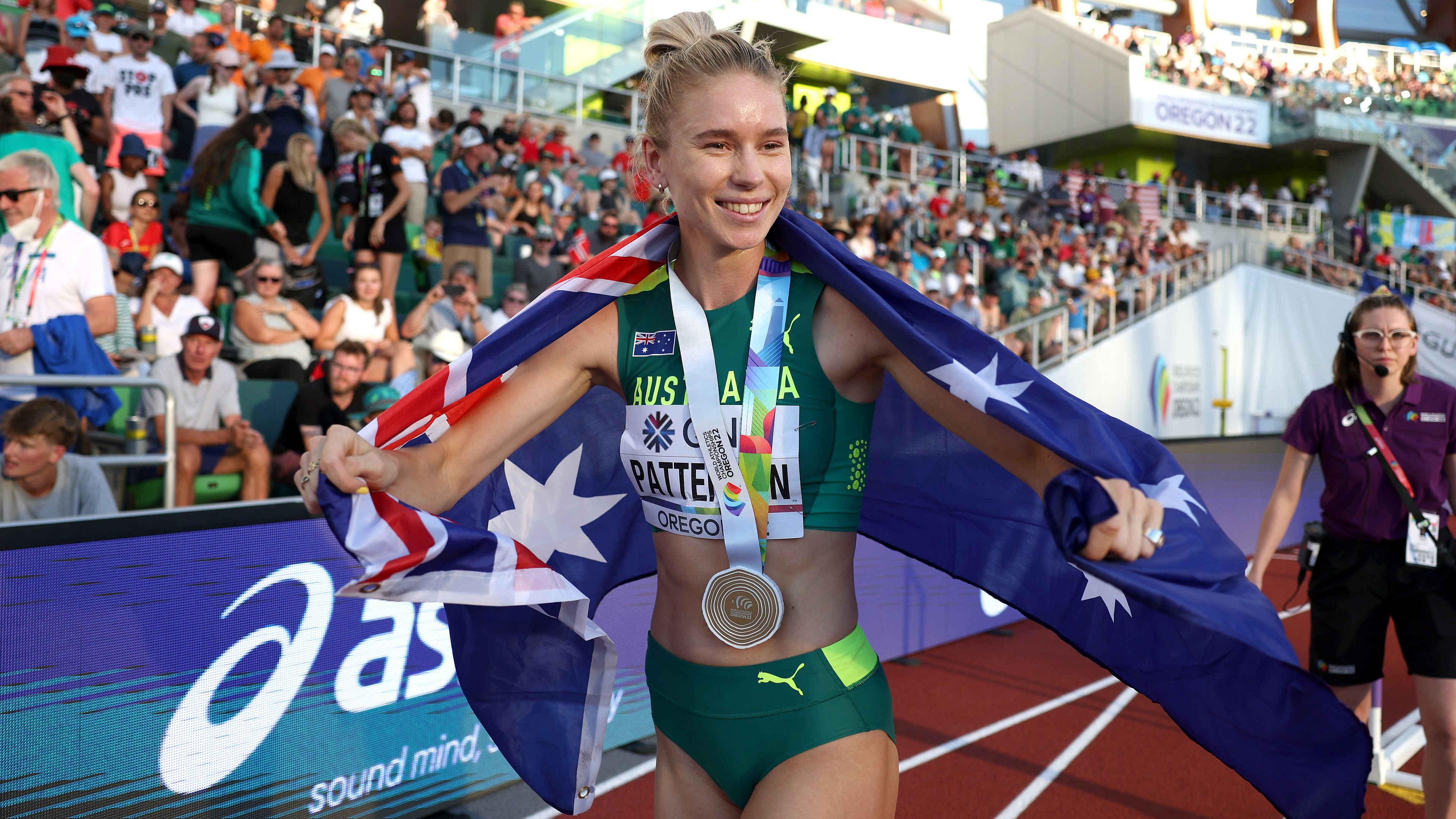 Gold medallist Eleanor Patterson celebrates after winning in the women&#x27;s high jump final.