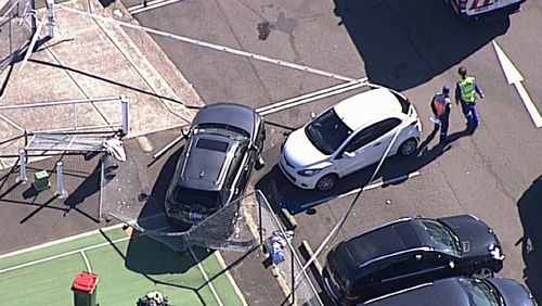 Police are investigating after a car ploughed into two pedestrians south of Sydney today. Image: 9NEWS