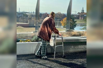 Alice Tapper, 15, using a walker after emergency surgery.