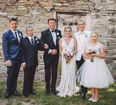 Richard Wilkins together with his five kids at his eldest daughter Becky's wedding