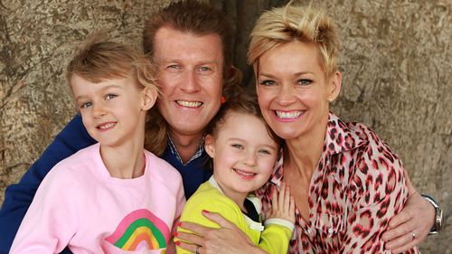In this 2013 file photo: Overton with his wife Jessica Rowe and their two daughters Allegra and Giselle.
