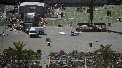 Debris is strewn across the site of the music festival. (AP)