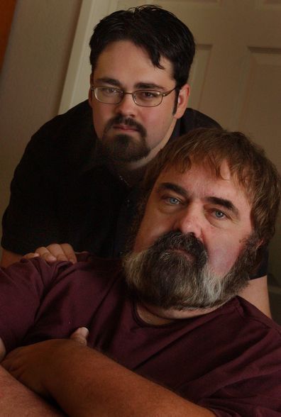 Zachary, top, and father Walter Olkewicz at their home, Thursday afternoon in Burbank in 2003.